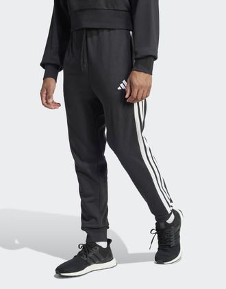 adidas Essential - Pantaloni in French Terry nero e bianco con 3 strisce