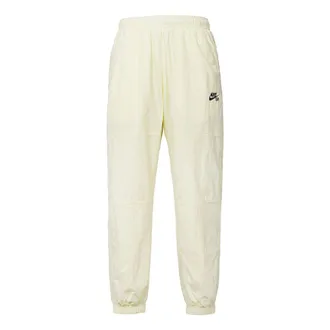 Nike Mens Nike Logo Pattern Loose Bundle Feet Sports Pants/Trousers/Joggers Beige CW7716-113
