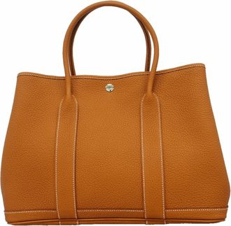 Herm&egrave;s Gold Negonda Leather Tote Bag (Pre-Owned)