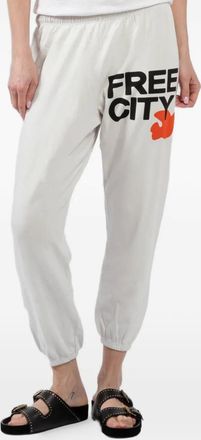 Freecity logo-lettering track pants - Beige