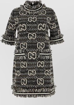 Gucci G textured mini dress featuring intricate embroidery