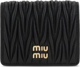 Miu Miu logo-lettering matelassé wallet - Black