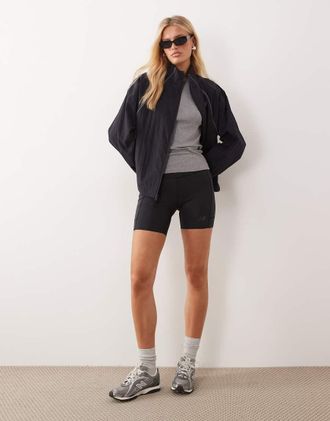 New Balance giacca sport legacy nera-Nero