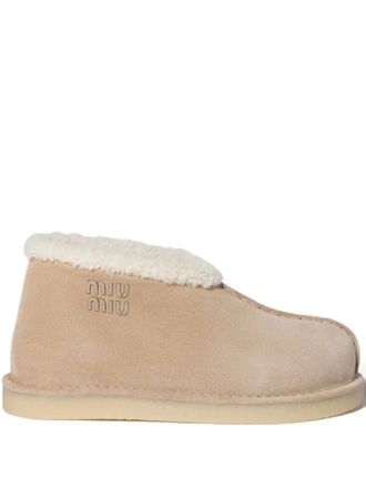 Miu Miu embroidered-logo shearling boots - Neutrals