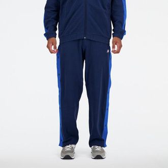 New Balance Hombre Sportswears Greatest Hits Snap Pant en Azul, Poly Knit, Talla 2XL