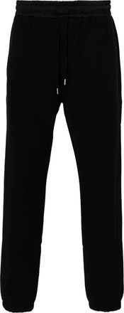 Saint Laurent Zwarte katoenen joggingbroek in trainingspakstijl - Heren - Sweatpants - Zwart - M - Katoen - Broeken