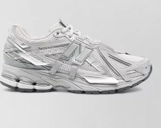 New Balance paneled low-top sneakers