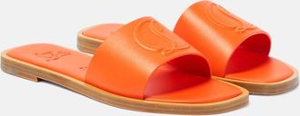 Christian Louboutin CL embossed leather mules