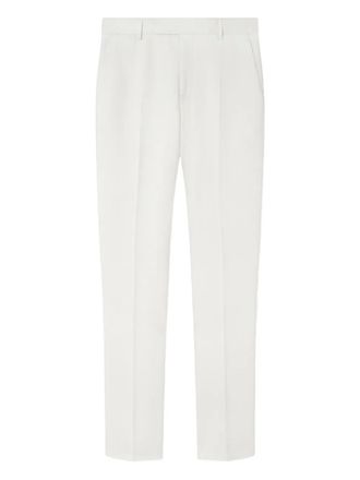 Versace logo-patch trousers - White