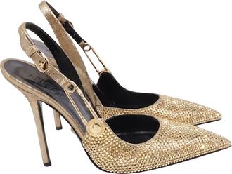 Versace Safety Pin Embellished Pumps in Gold Crystal
