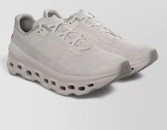 On perforated low-top sneakers
