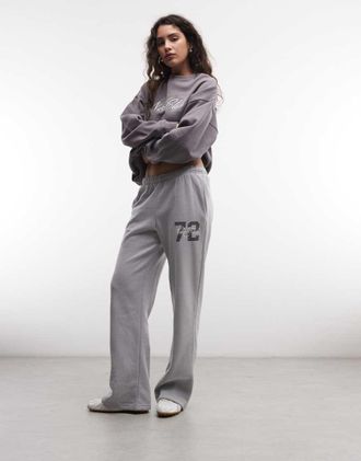 Nike Studio Fleece joggers vita medio alta con fondo aperto grigi con logo-Grigio