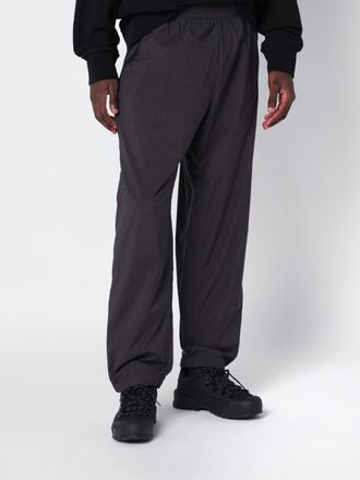 The North Face Pantaloni jogging TNF Red Box a gamba larga in tessuto tecnico Windwall