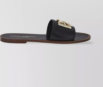Dolce & Gabbana flat leather slide sandals with front embellishment