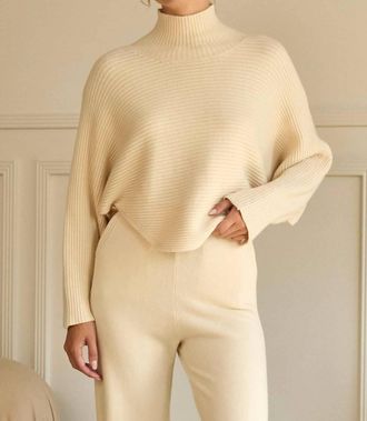 Skies Are Blue Clothing Carrie Cozy Funnel Neck Swing Sweater In Beige