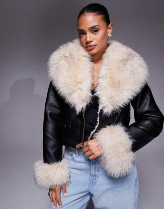 River Island Giacca biker corta nera con colletto in pelliccia sintetica-Nero