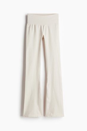 H&M Ausgestellte Seamless Sportleggings mit DryMove - Beige