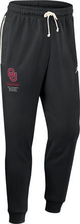 Nike Jordan Mens Oklahoma Sideline Standard Issue Jordan Brand Dri-FIT College Taper Pants in Black | 0JB000AOKN-WL2