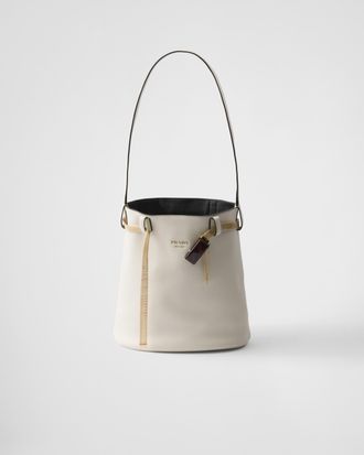 Prada Buckle leather bucket bag with jeweled belt