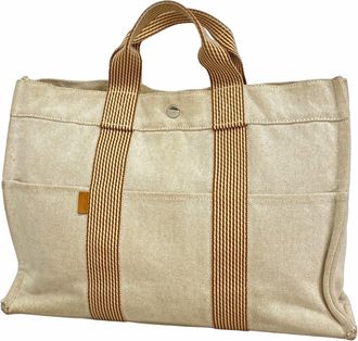 Herm&egrave;s Beige Canvas Tote Bag (Pre-Owned)