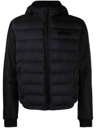 Moschino rubberised-logo puffer jacket - men - Polyester - 50 - Black