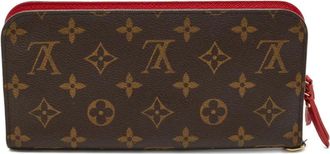 Louis Vuitton Insolite portemonnee met monogram - Bruin