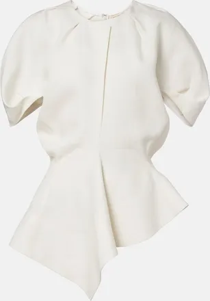 Khaite Rumi peplum linen-blend top