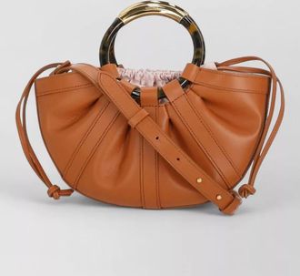 Coccinelle leather bucket bag tortoiseshell handles strap