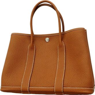 Herm&egrave;s Gold Negonda Leather Tote Bag (Pre-Owned)