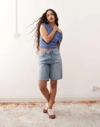Weekday low waist knee length denim shorts in blue