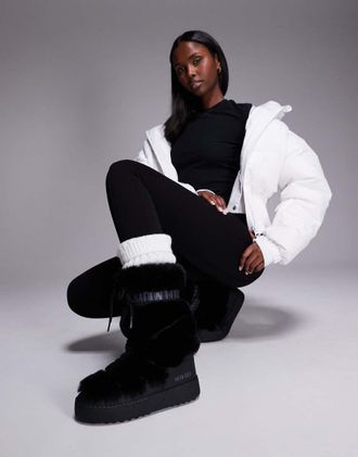 Moon Boot Ltrack High - Stivali neri impermeabili con dettagli in pelliccia sintetica-Nero