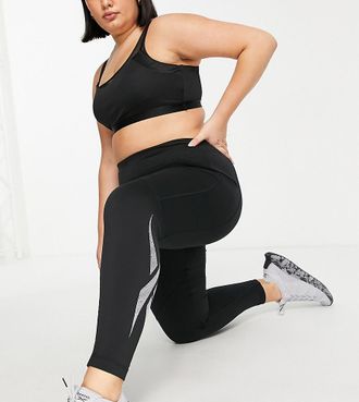 Reebok Training Plus Lux high waisted panelled leggings in purple