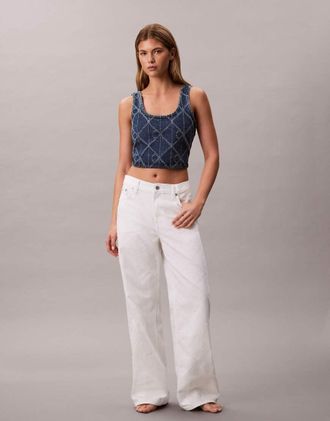Calvin Klein Jeans Jeans ampi a vita bassa &eacute;cru con logo taglio laser ripetuto-Neutro