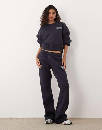 New Balance pantaloni della tuta in pile neri-Nero