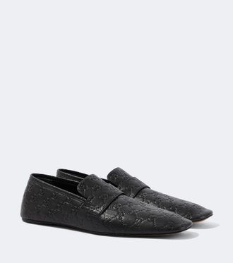 Gucci GG embossed leather loafers