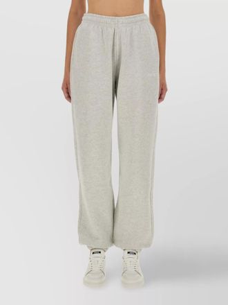 Rotate trousers with elastic waistband and side pockets