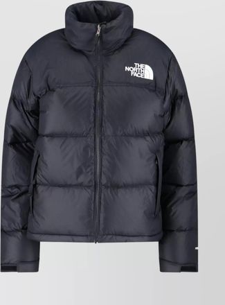The North Face quilted jacket with high collar and long sleeves