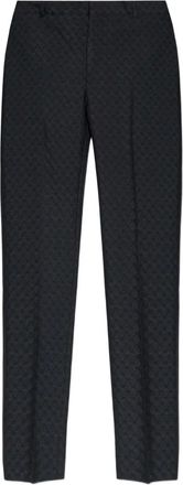 Alexander McQueen Pantaloni con stampa teschi - Nero