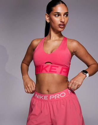 Nike Nike - Pro Training Indy Dri-FIT - Reggiseno sportivo rosa a supporto leggero con scollo profondo