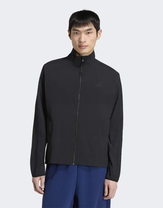 adidas City - Top tecnico sportivo nero con 3 strisce