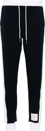 Thom Browne Pantaloni della tuta Thom Browne con 4 barre ingegnerizzate in jersey loopback classico tinta unita a blocchi di colore