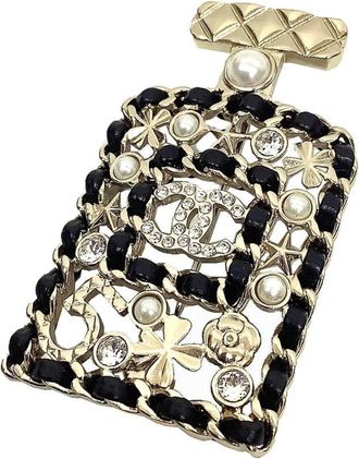 Chanel gold Brass Leather Brooch (Pre-Owned)