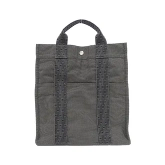 Herm&egrave;s Her Line Black Canvas Backpack (Pre-Owned)