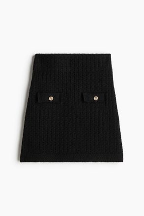 H&M Jupe in Pointellestrick - Schwarz