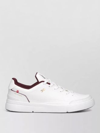 On low sneakers perforated toe lace up design