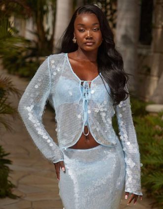 South Beach Top da mare a maniche lunghe blu allacciato sul davanti con paillettes