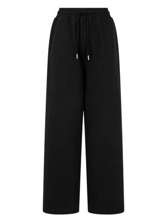 TOMBOY logo-embroidered pocket sweatpants - women - Cotton - OS - Black