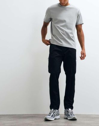 Capo pantaloni cargo utility tech neri-Nero