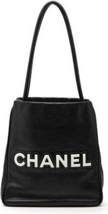 Chanel Pre-owned Shoulder Bags, female, Black, Size: ONE SIZE Pre-owned Camellia Embossed Tote
