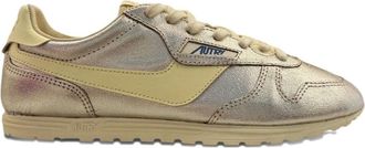 Autry Windspin perforated logo-detail sneakers - women - Foam Rubber/Calf Leather/Fabric - 36 - Gold